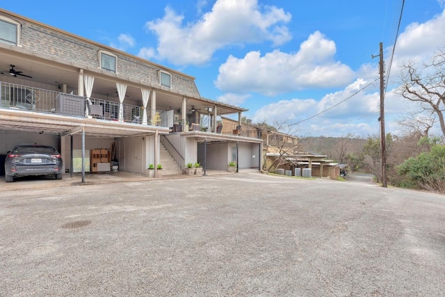 view of property featuring stairway