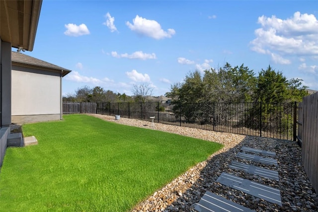 view of yard featuring a fenced backyard