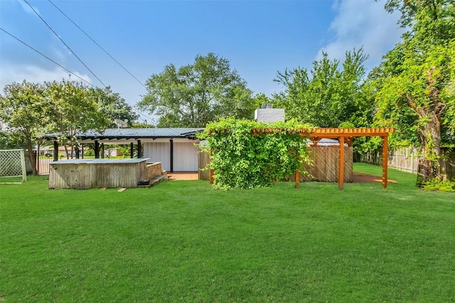 view of yard featuring fence, a pool, and a pergola