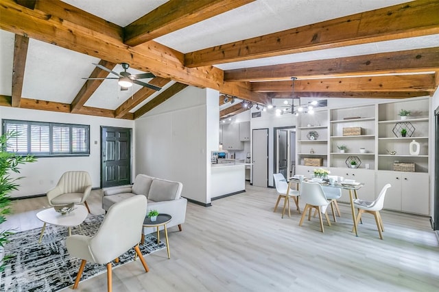 dining area featuring light wood-style floors, vaulted ceiling with beams, and ceiling fan with notable chandelier