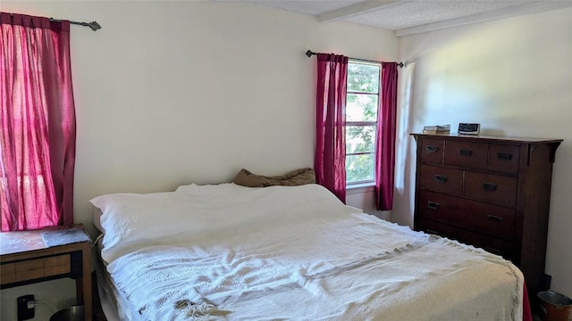 bedroom featuring a textured ceiling