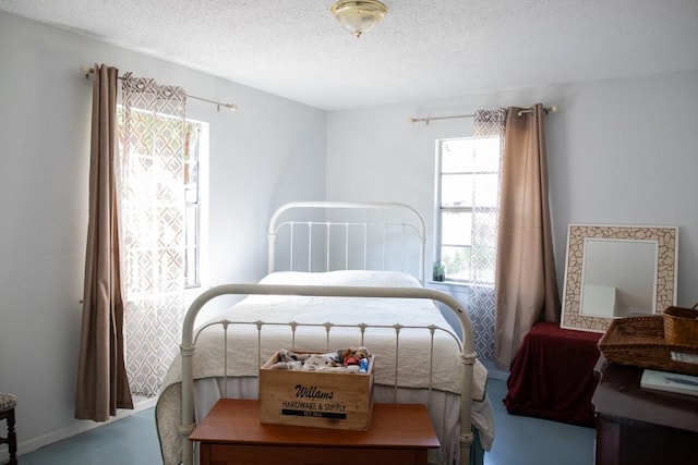 bedroom featuring a textured ceiling