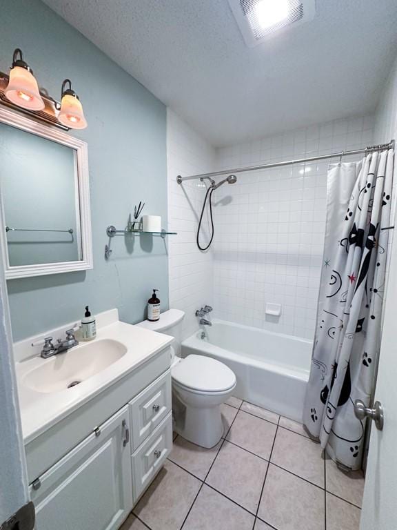 902 Austin Highlands Blvd, Austin, TX 78745 - bathroom with vanity, tile patterned flooring, shower / tub combo, and toilet