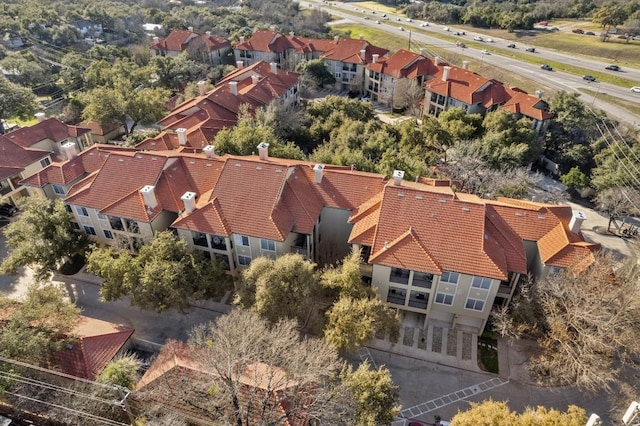 birds eye view of property with a residential view