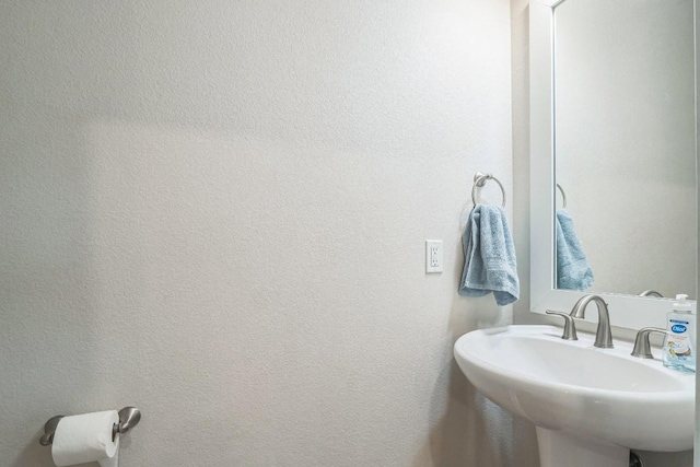 205 Birch Oak Ln, Georgetown, TX 78628 - bathroom with a sink and a textured wall