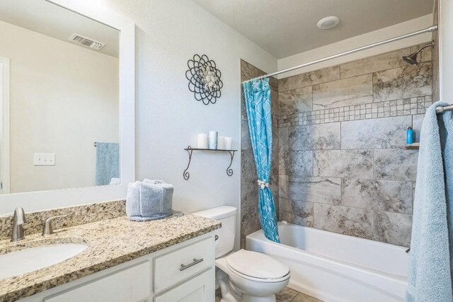 205 Birch Oak Ln, Georgetown, TX 78628 - full bath featuring vanity, toilet, shower / tub combo, and visible vents