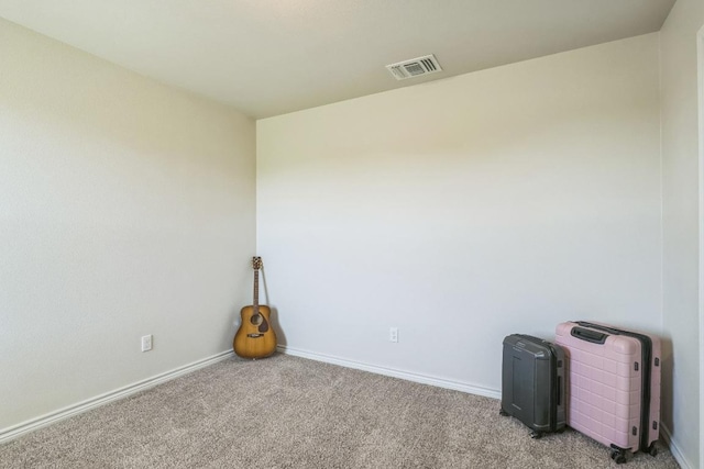 205 Birch Oak Ln, Georgetown, TX 78628 - spare room featuring light colored carpet, baseboards, and visible vents