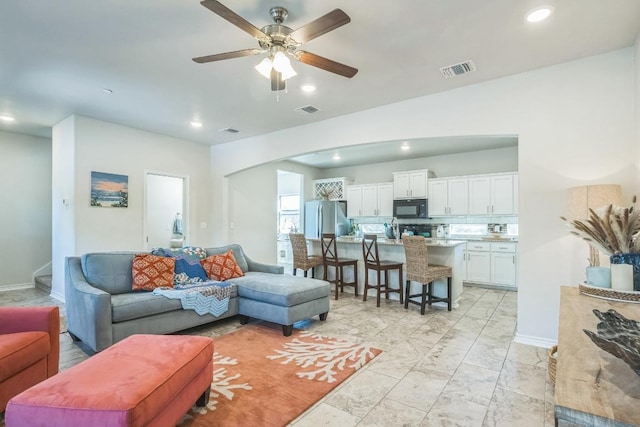 205 Birch Oak Ln, Georgetown, TX 78628 - living area featuring a ceiling fan, visible vents, and recessed lighting