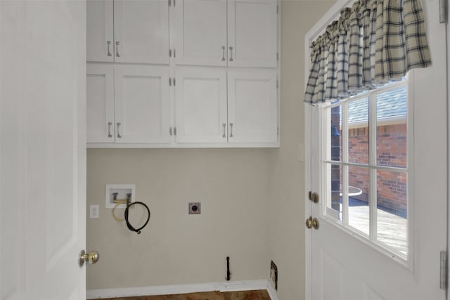 laundry room with cabinet space, washer hookup, plenty of natural light, and electric dryer hookup