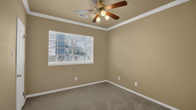 unfurnished room with a ceiling fan, visible vents, baseboards, ornamental molding, and carpet