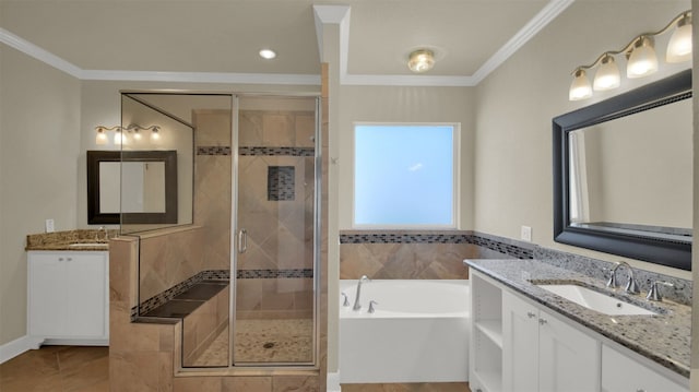 full bathroom featuring ornamental molding, a garden tub, a sink, and a shower stall