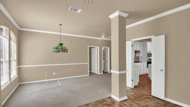 unfurnished dining area with a wealth of natural light, visible vents, baseboards, and ornamental molding