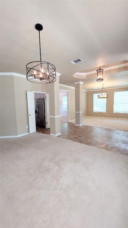2002 Wood Glen Dr, Round Rock, TX 78681 - empty room with a chandelier, baseboards, ornamental molding, and carpet floors