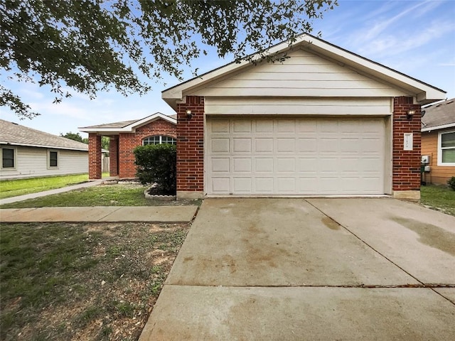 12804 Sago Palm Trl, Elgin, TX 78621 - ranch-style home featuring brick siding, concrete driveway, and an attached garage