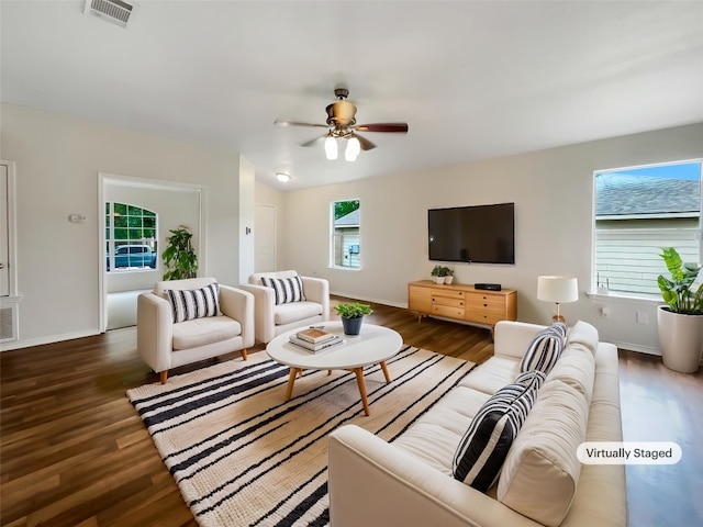 12804 Sago Palm Trl, Elgin, TX 78621 - living area featuring wood finished floors and a ceiling fan
