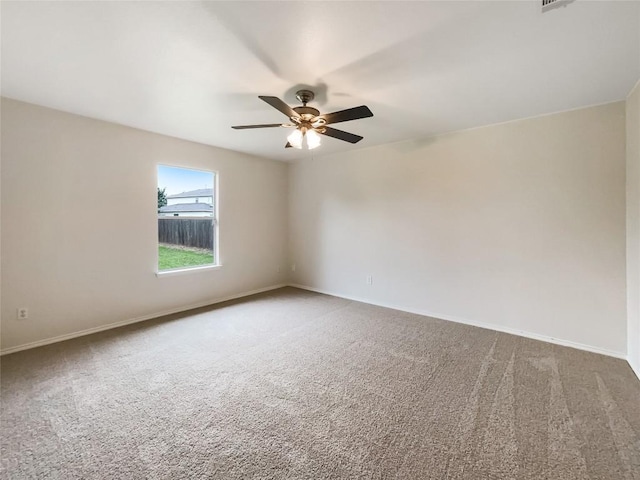 12804 Sago Palm Trl, Elgin, TX 78621 - carpeted spare room with ceiling fan and baseboards