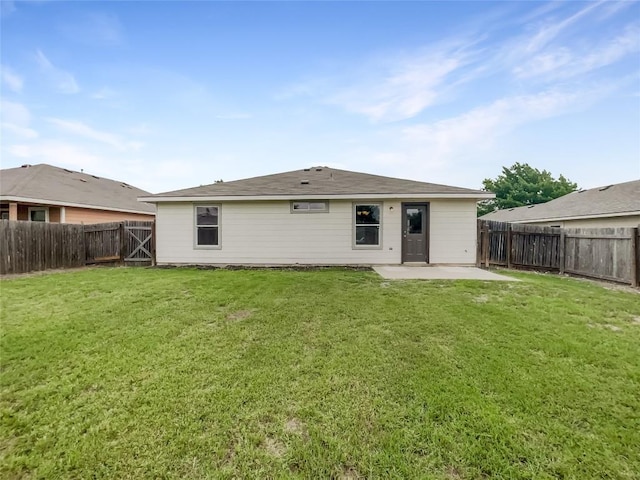 12804 Sago Palm Trl, Elgin, TX 78621 - rear view of house featuring a patio and a fenced backyard
