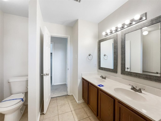 12804 Sago Palm Trl, Elgin, TX 78621 - bathroom featuring double vanity and tile patterned flooring
