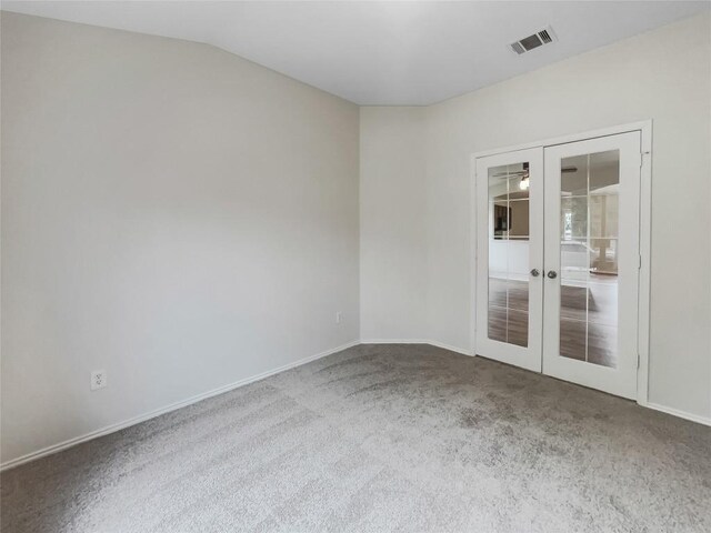 12804 Sago Palm Trl, Elgin, TX 78621 - unfurnished room with french doors and carpet floors