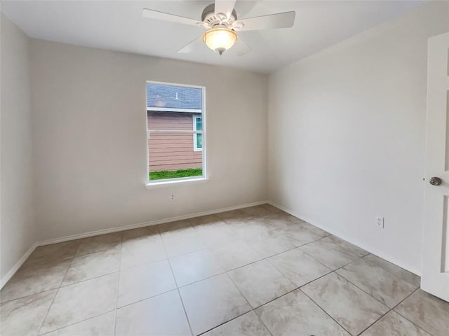 12804 Sago Palm Trl, Elgin, TX 78621 - spare room with baseboards and ceiling fan