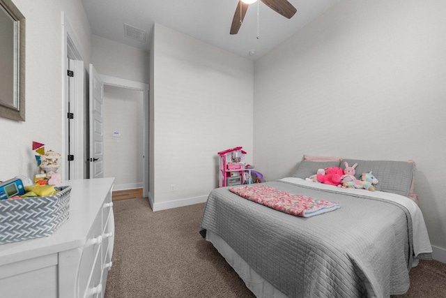 bedroom with light carpet, a ceiling fan, visible vents, and baseboards