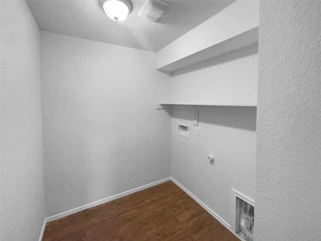 clothes washing area featuring hookup for a washing machine, hookup for a gas dryer, laundry area, visible vents, and baseboards