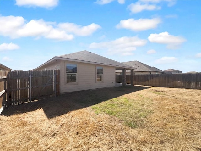 106 Lillian Dr, Taylor, TX 76574 - back of property featuring a fenced backyard