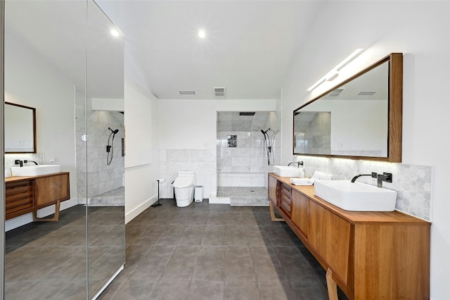 full bathroom with a walk in shower, double vanity, a sink, and visible vents