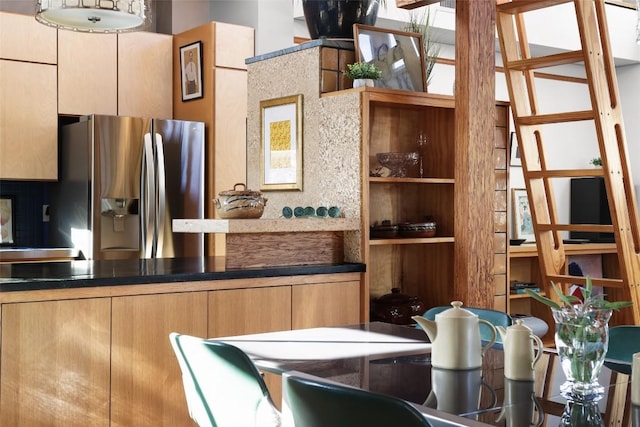 2010 S 2nd St, Austin, TX 78704 - kitchen featuring stainless steel fridge with ice dispenser and built in shelves