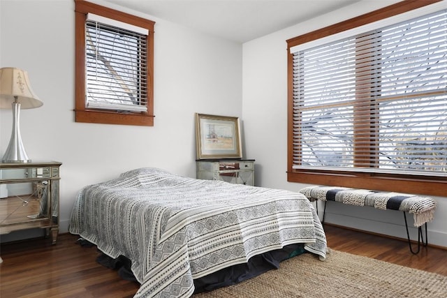 bedroom featuring wood finished floors