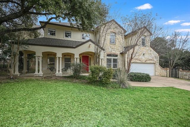 view of front of house with stone siding, concrete driveway, roof with shingles, stucco siding, and a front lawn