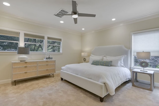 bedroom featuring recessed lighting, ornamental molding, a ceiling fan, light carpet, and baseboards