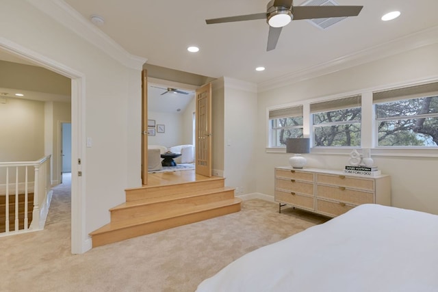 bedroom featuring recessed lighting, baseboards, crown molding, and light colored carpet