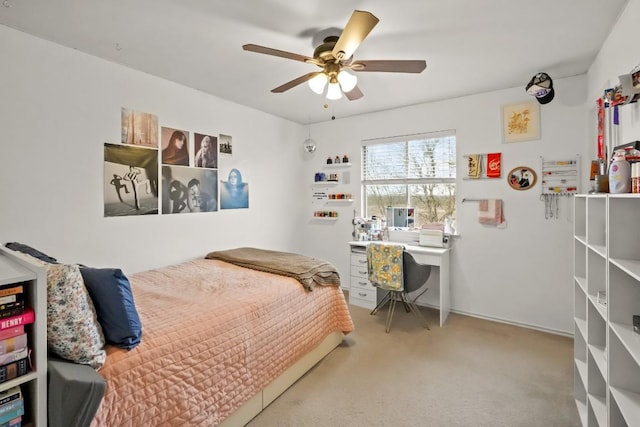 carpeted bedroom featuring a ceiling fan