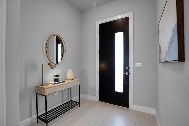 16909 Roselin Dr, Austin, TX 78738 - entryway with baseboards and light tile patterned flooring