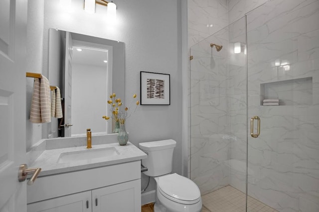 16909 Roselin Dr, Austin, TX 78738 - bathroom featuring toilet, vanity, and a marble finish shower