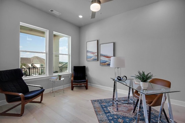 office with light wood-type flooring, visible vents, baseboards, and recessed lighting