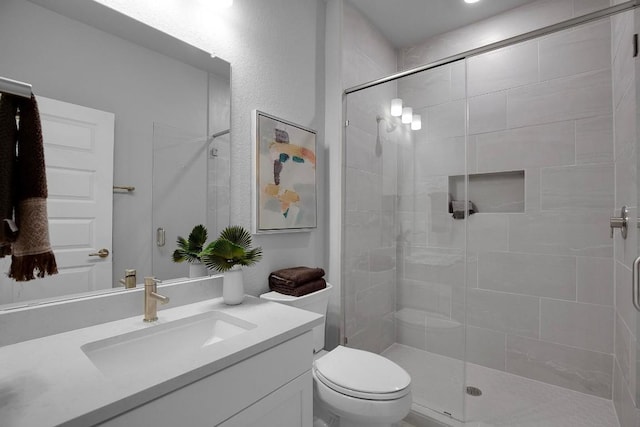 16909 Roselin Dr, Austin, TX 78738 - bathroom with toilet, vanity, and a stall shower