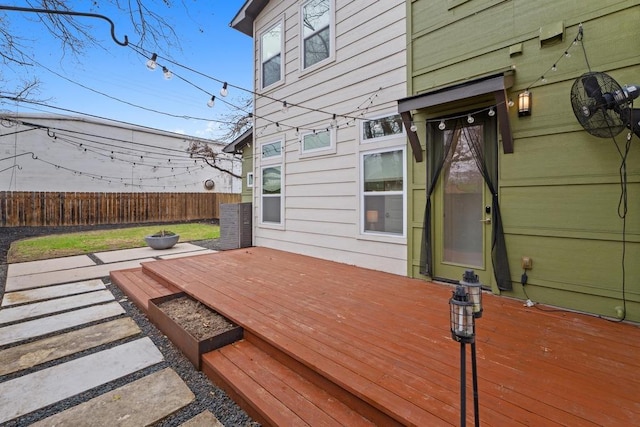 wooden deck featuring fence