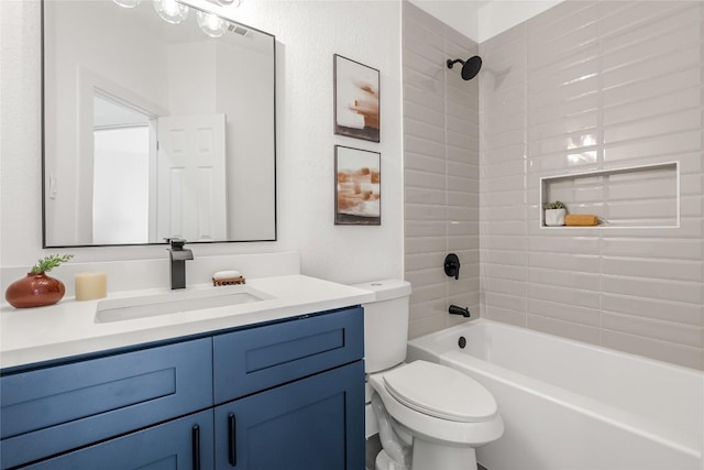 full bathroom featuring bathing tub / shower combination, vanity, and toilet