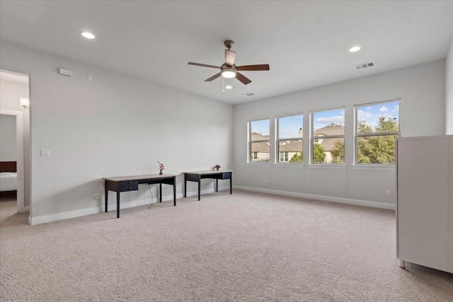 interior space with baseboards, visible vents, a ceiling fan, and recessed lighting