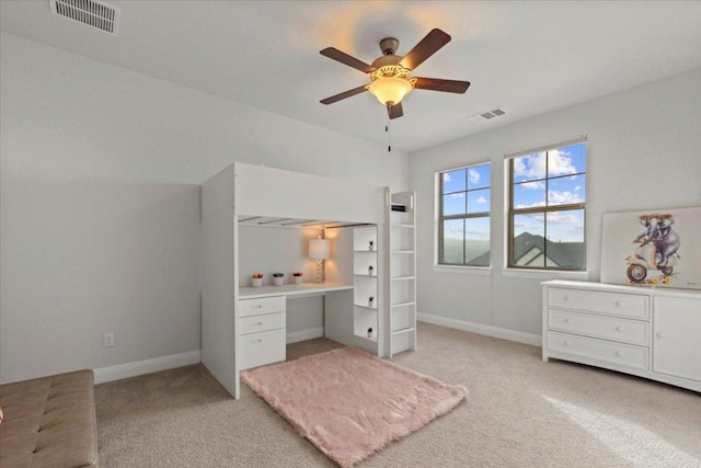 bedroom with light carpet, baseboards, and visible vents