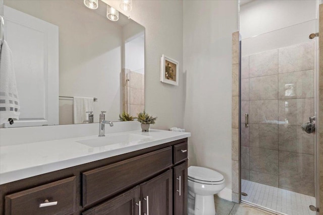 full bathroom with toilet, a stall shower, tile patterned flooring, and vanity