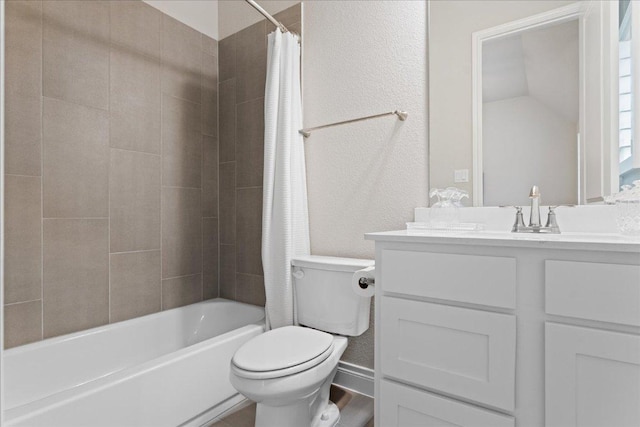 full bath with shower / tub combo, a textured wall, vanity, and toilet