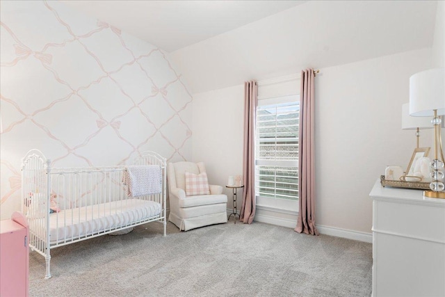 bedroom with carpet floors and baseboards