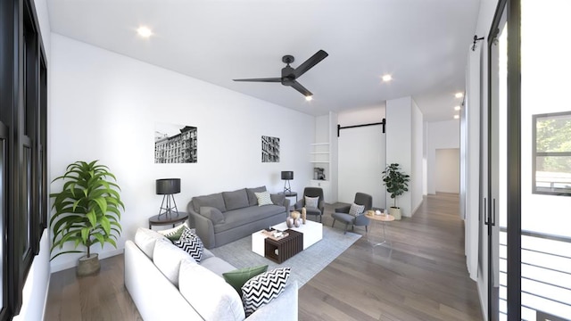 1832 Long Bow Dr, Leander, TX 78641 - living area with a barn door, wood finished floors, ceiling fan, and recessed lighting