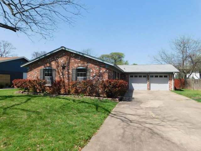 ranch-style house with an attached garage, brick siding, driveway, and a front lawn