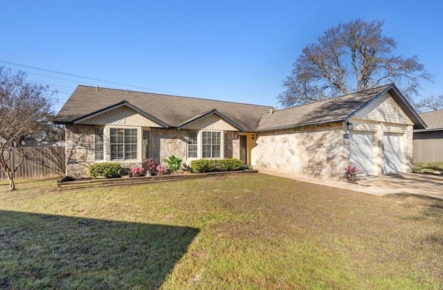 ranch-style home with driveway, a garage, stone siding, fence, and a front lawn