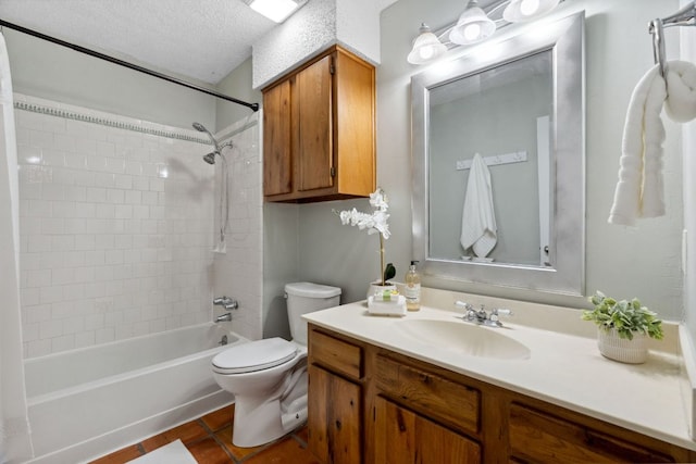 bathroom featuring a textured ceiling, shower / tub combination, toilet, vanity, and tile patterned floors