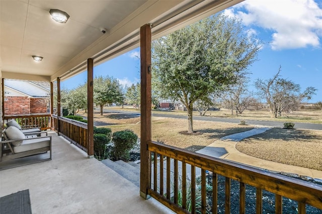 view of patio featuring a porch